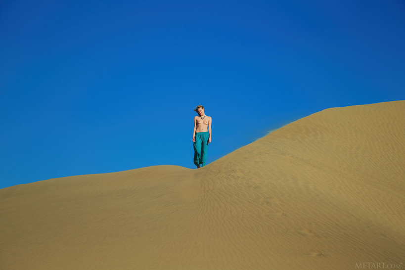 her breasts bared to the sun - 