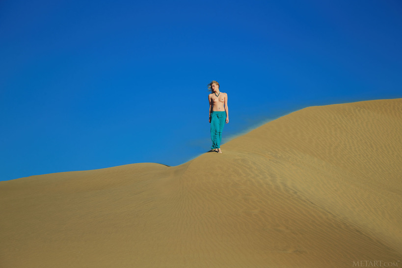 her breasts bared to the sun - 